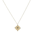 Collier doré avec pendentif médaille motif croix incrusté de strass noirs