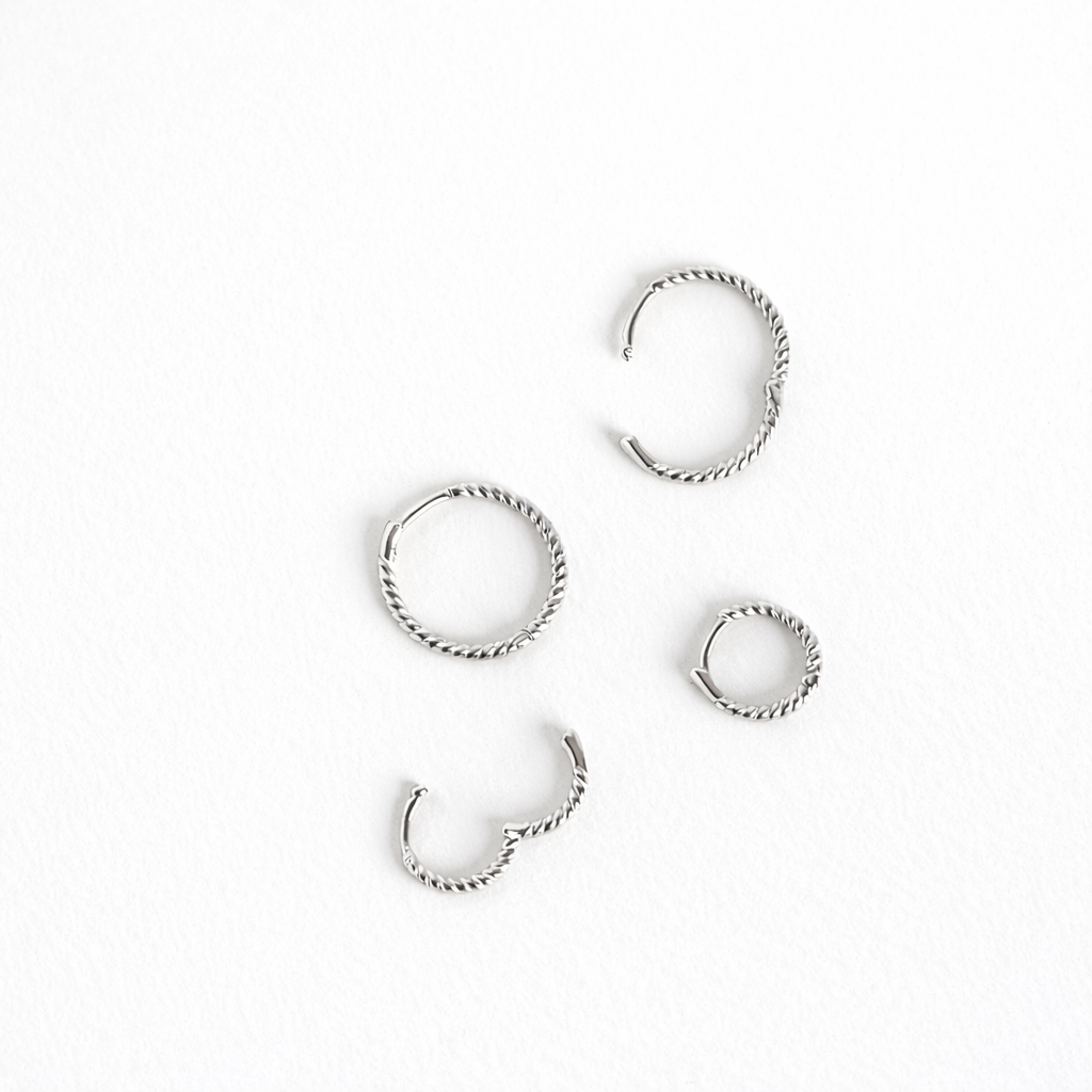 Boucles d'oreilles créoles torsadées en Argent 925